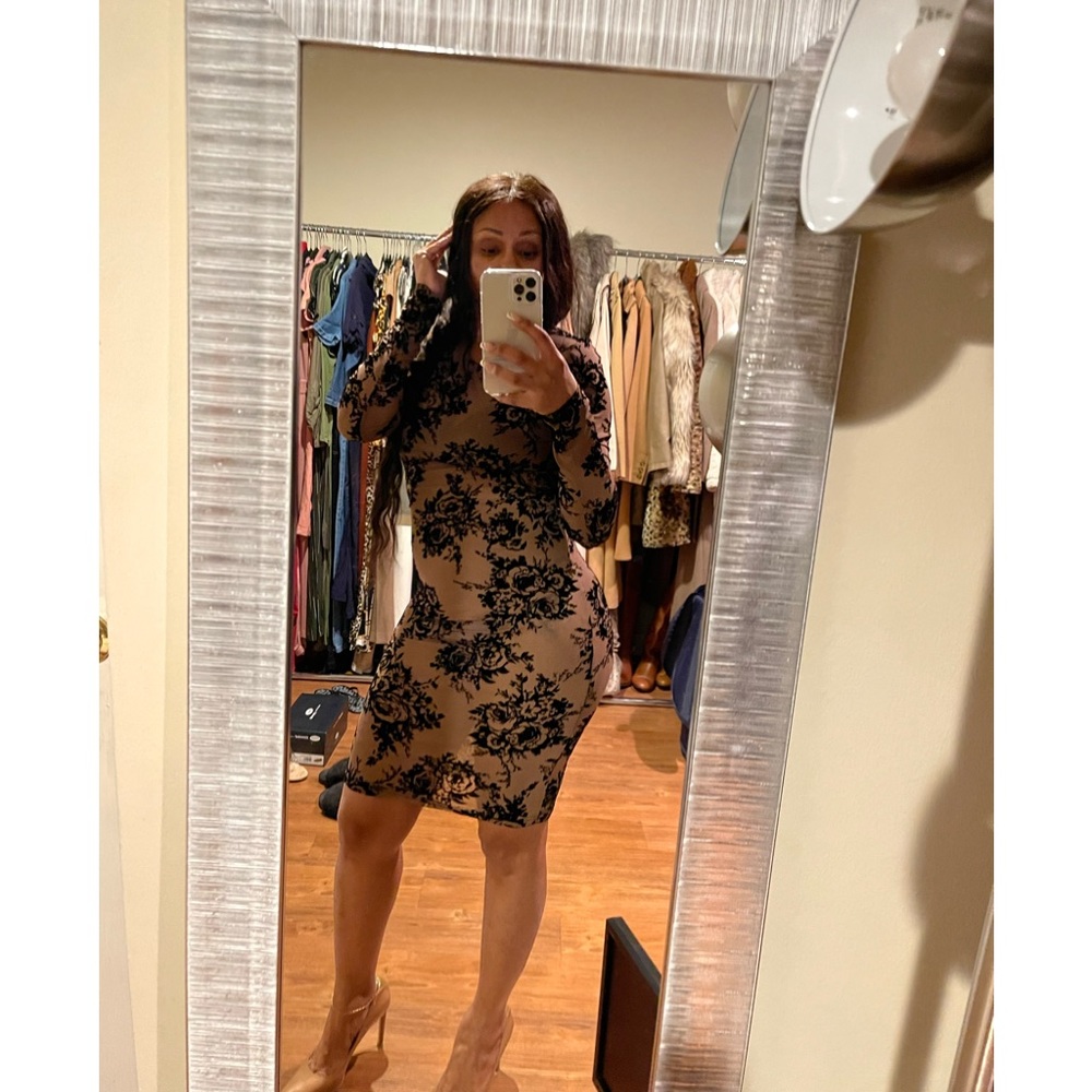 Brand new sheer like dress .. . Black and brown floral print .